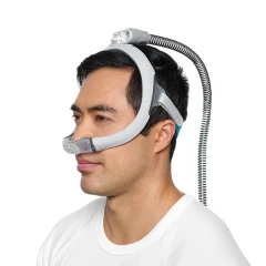 Person_wearing_ResMed_AirTouch_N30i_Nasal_Mask.webp